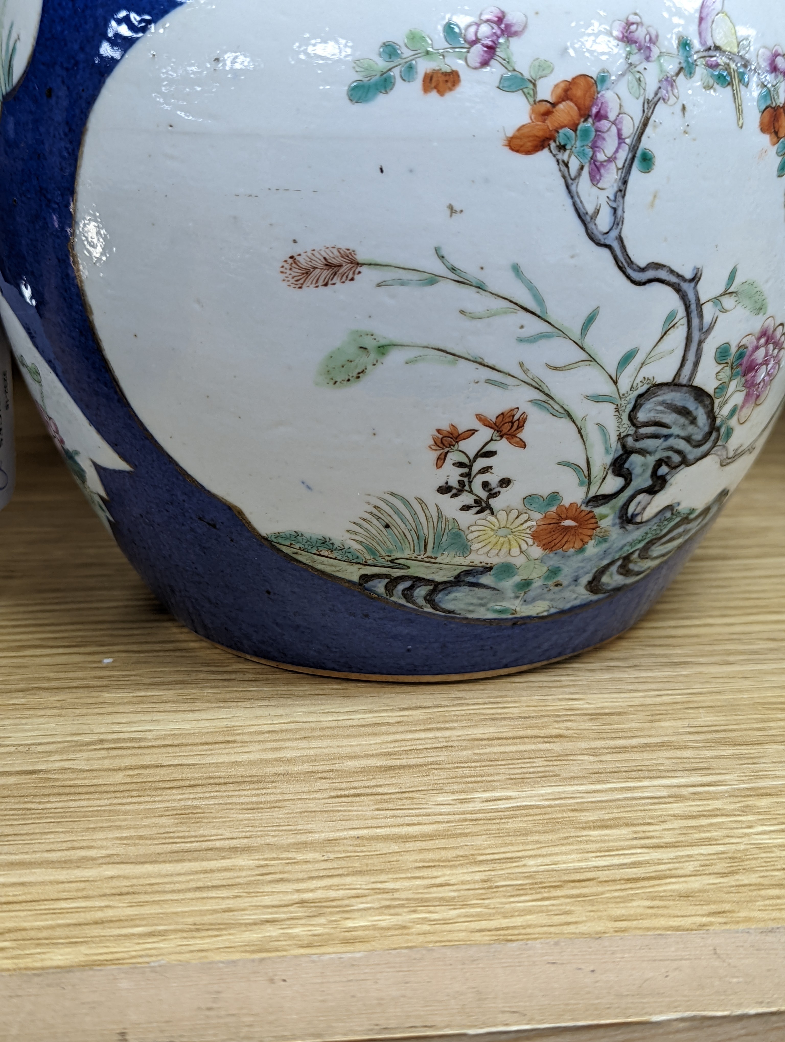 A Chinese blue ground jar and cover, 19th century, Qianlong mark to base, 20cm high